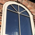 Arched upvc window in cream finish