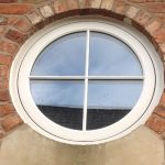 Round upvc timber look window with double glazing