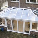 White edwardian uPVC conservatory with brick base