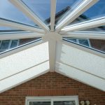 Roof system for conservatory with custom made blinds